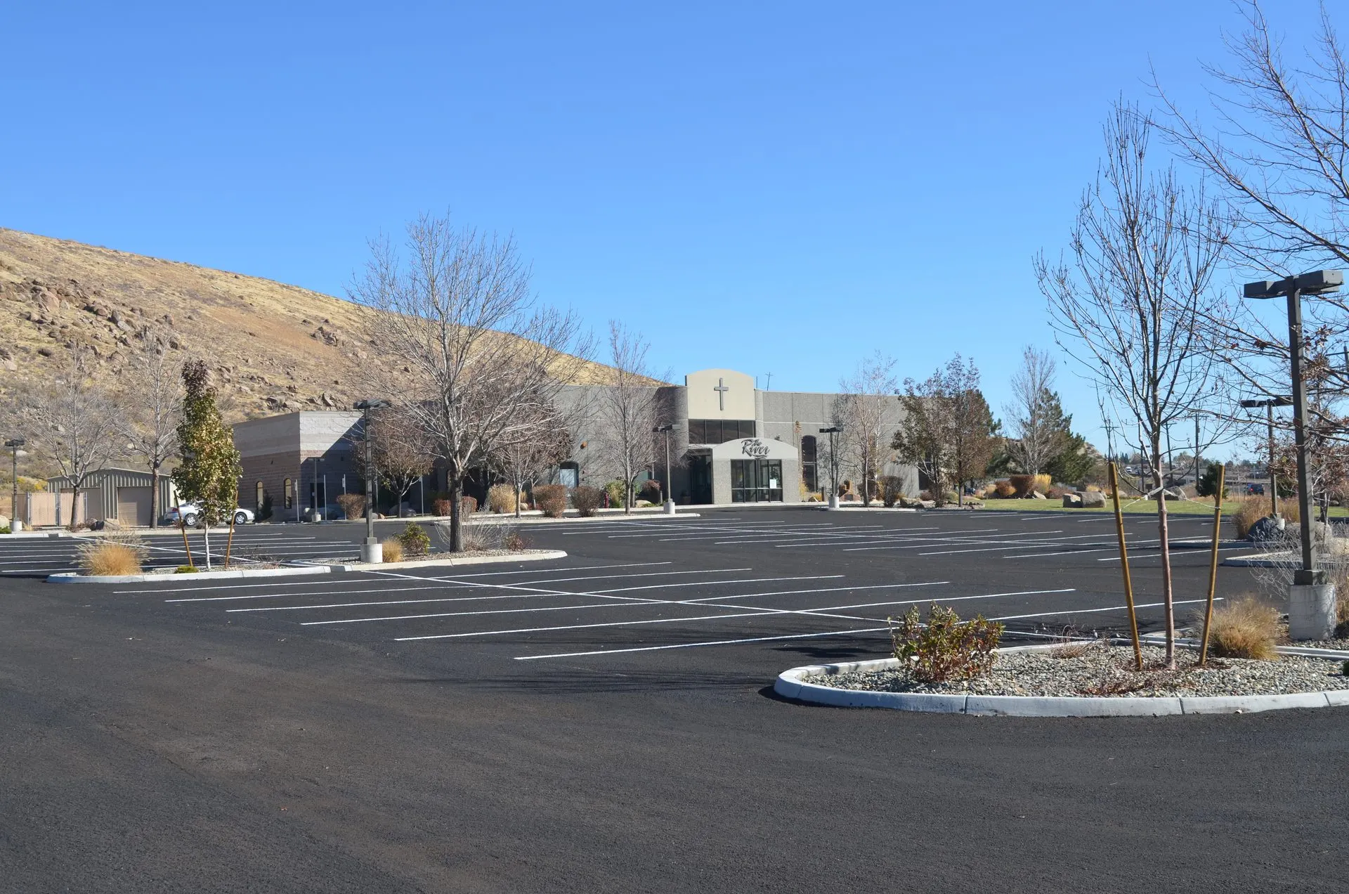 Community church building with completed parking lot and accessible stalls