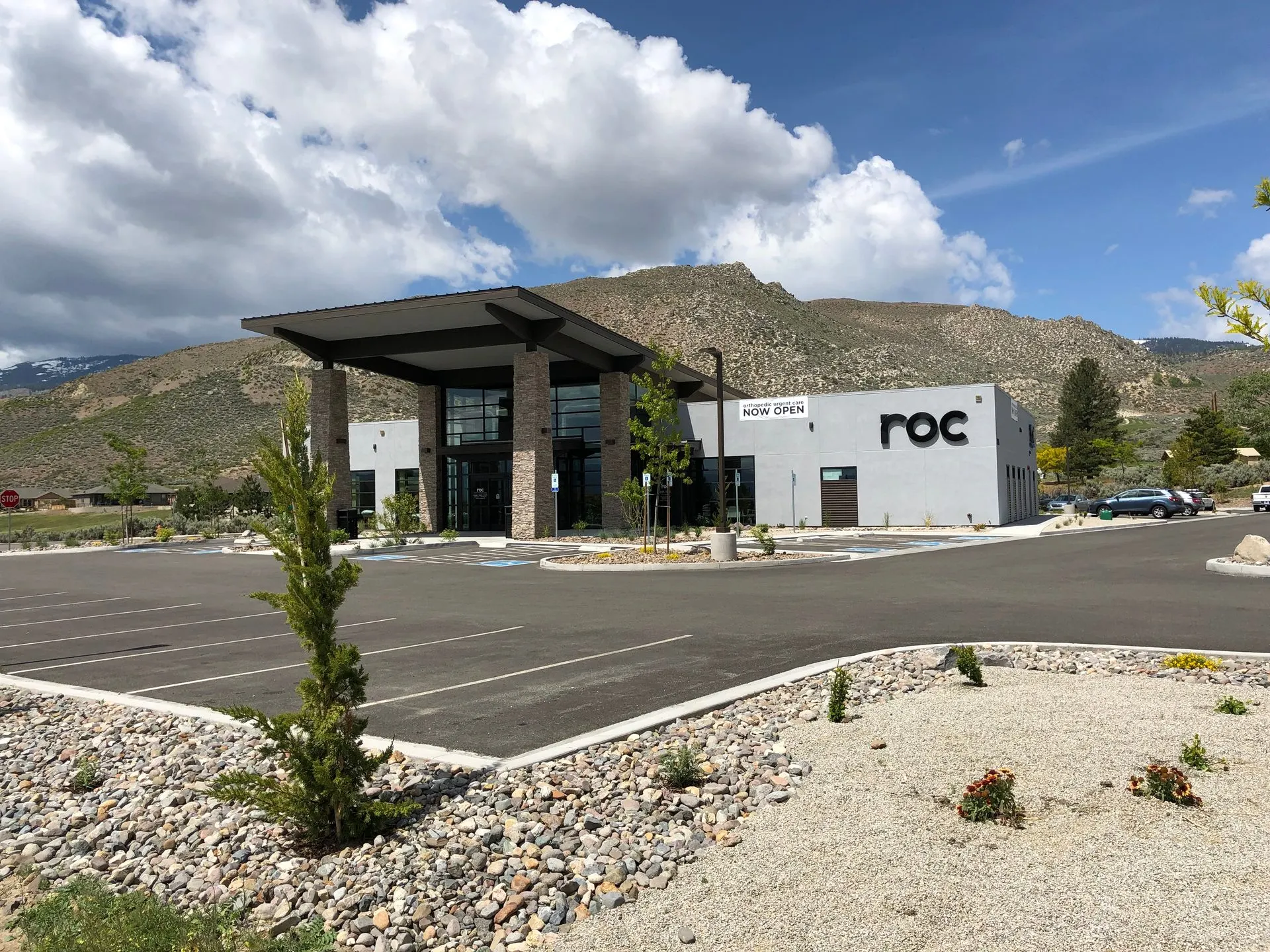 ROC Orthopedic Urgent Care building exterior with parking and accessible entry