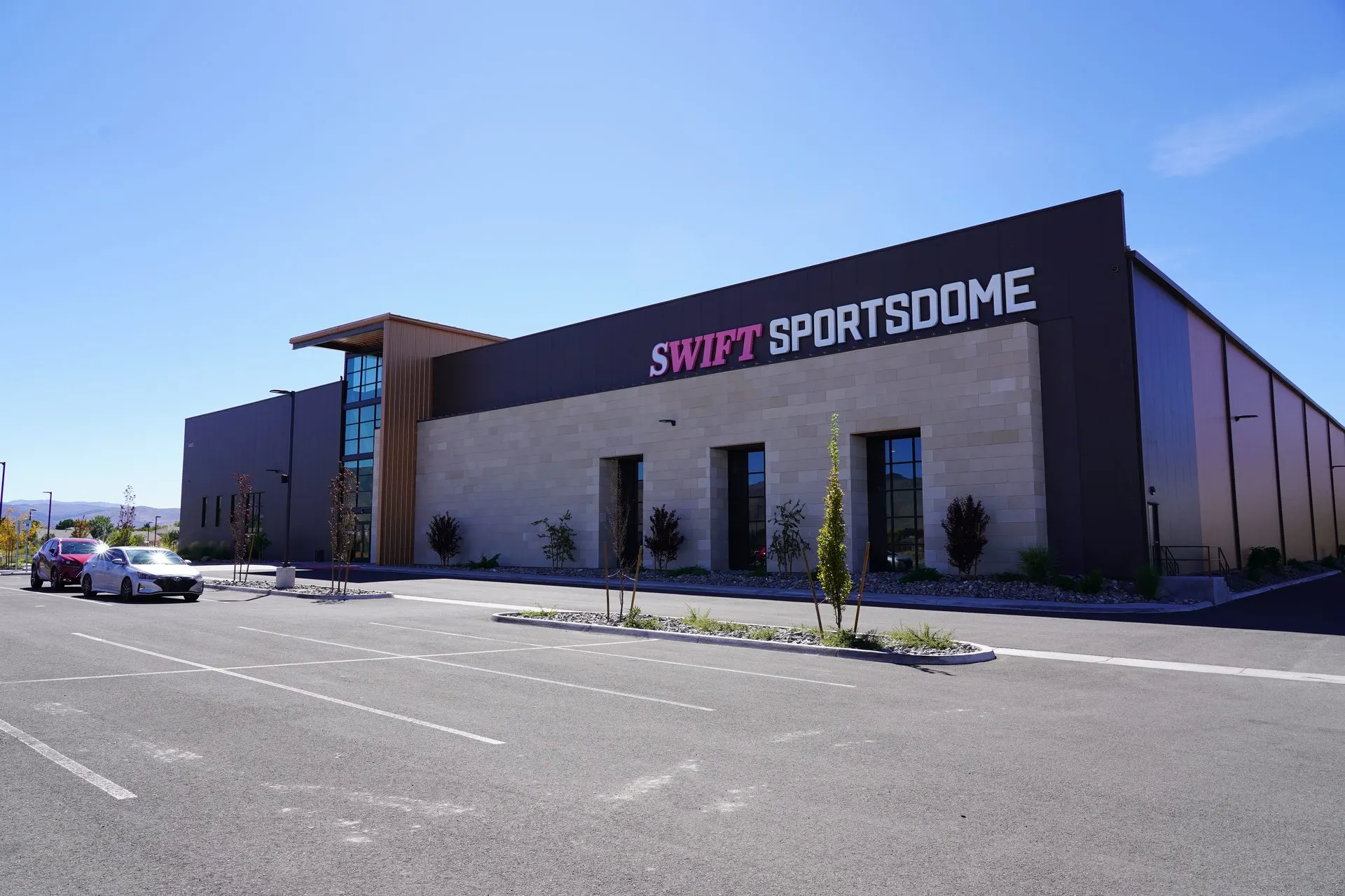 Swift Sportsdome exterior with parking and access improvements