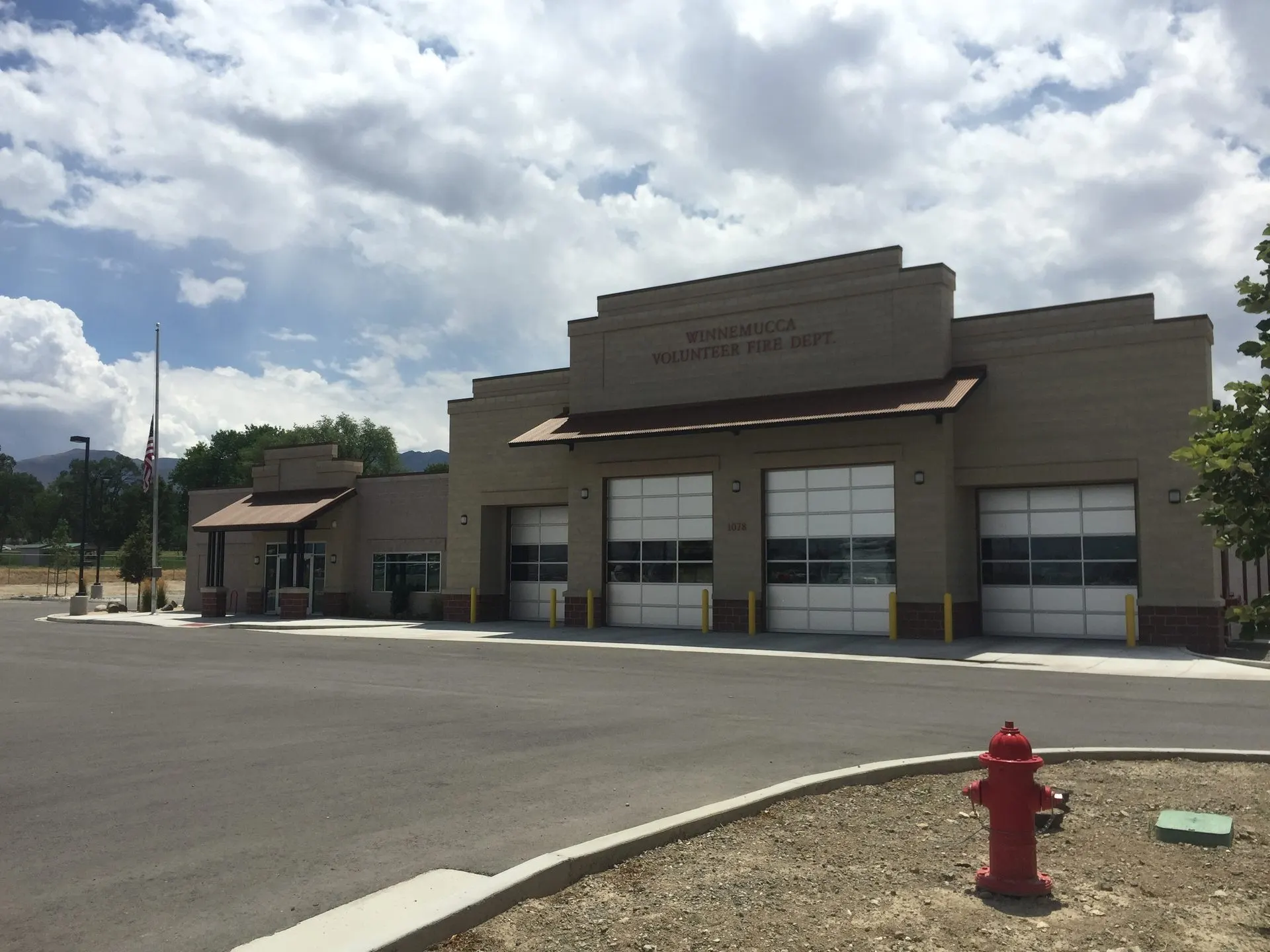 Winnemucca Volunteer Fire Department station with apparatus bay apron and paved access